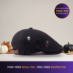 Black flat cap with Halloween skull and reaper pins. The Back Nine Halloween: free pin with every pack