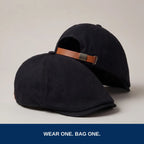 Two black no-logo flat caps: wear one, bag one