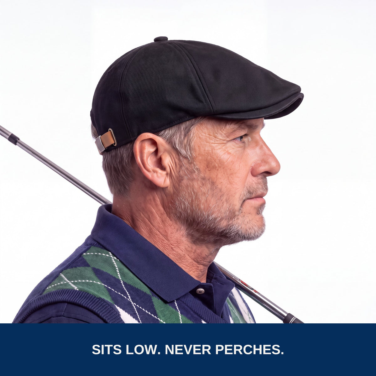 Golfer wearing the black flat cap, side profile
