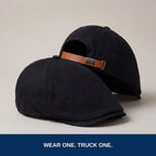 Two black flat caps. Wear one, truck one