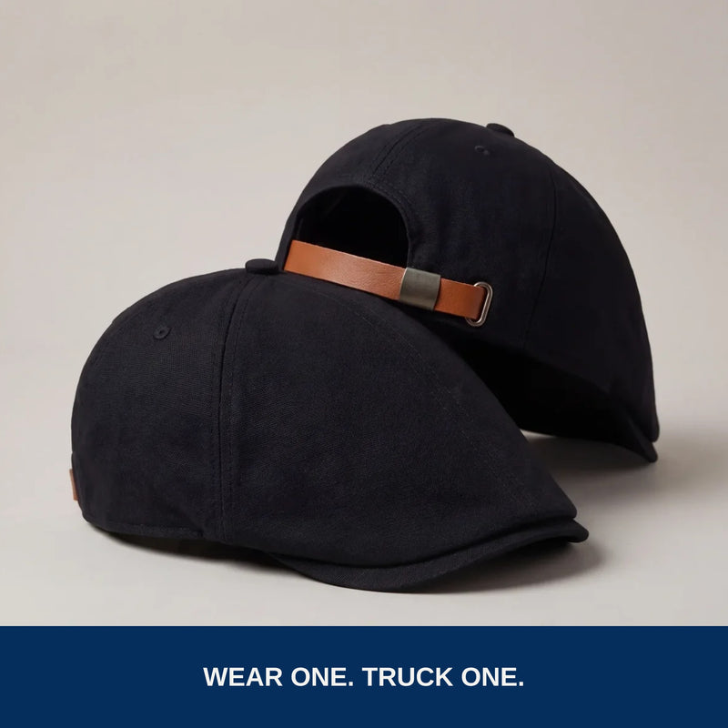 Two black flat caps. Wear one, truck one