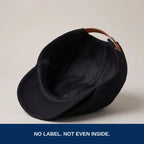 Inside of the flat cap, no label