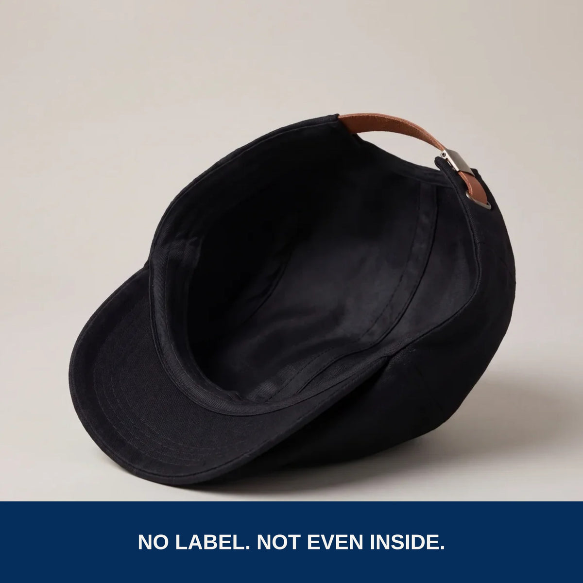 Inside of the flat cap, no label